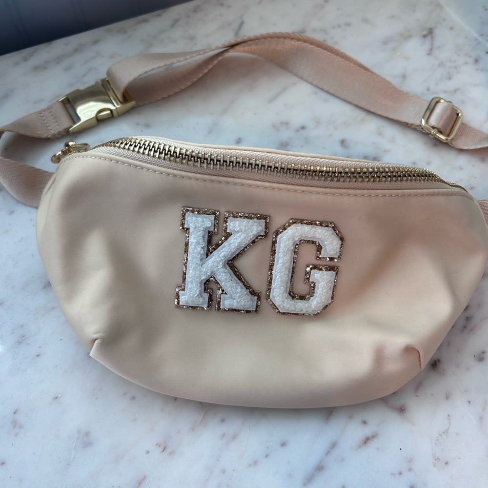 Stoney Clover Lane Cream Crossbody Bag with “KG” letters
